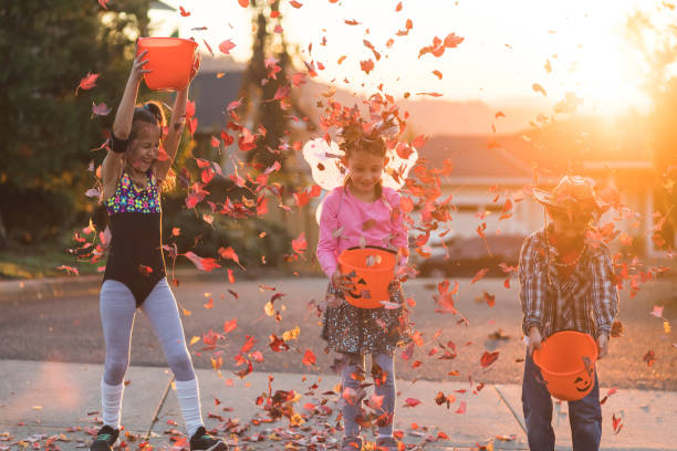 istock Multiethnic group of kids trick or treating 1007254496