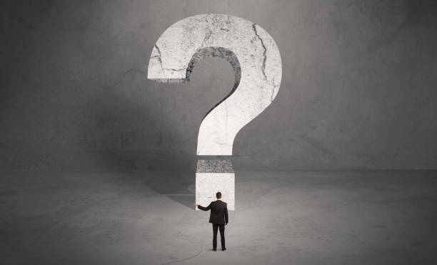 istock Confused businessman and big question mark 1007255220