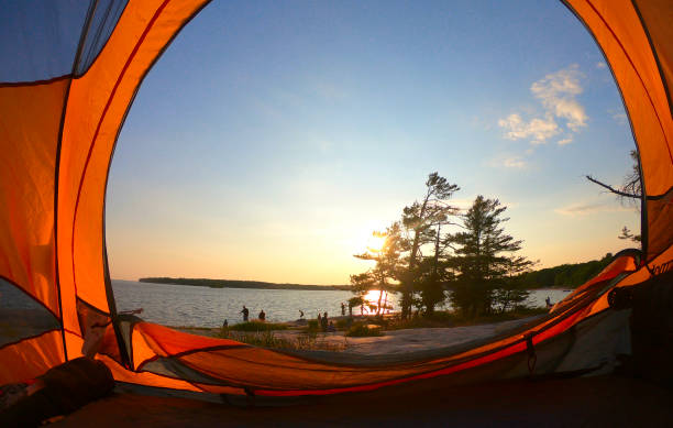 Spiritual Moment as the Sun Starts to Set Spiritual Moment as the Sun Starts to Set boundary waters canoe area stock pictures, royalty-free photos & images