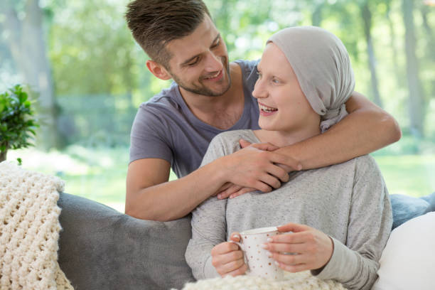 istock Happy husband hugging his recovering wife 1007258164