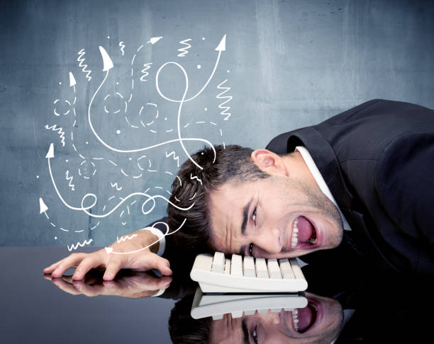 istock Business person with frustrated thoughts 1007261564