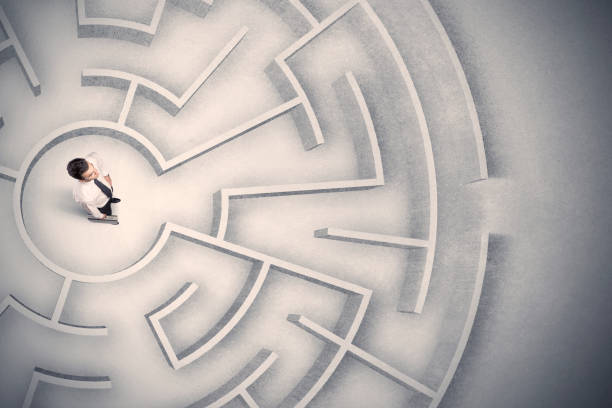 istock Business man trapped in a circular maze 1007262132