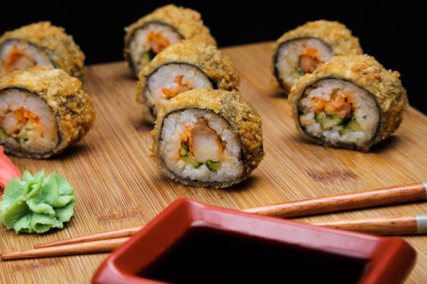 istock Hot fried Sushi Roll with shrimp and caviar. 1007262730