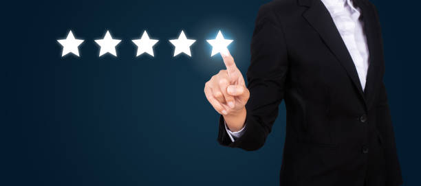 istock business pointing five star to increase the rating. 1007263244