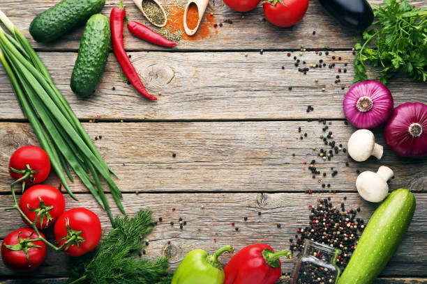 istock Frame of variety vegetables on wooden table 1007263250
