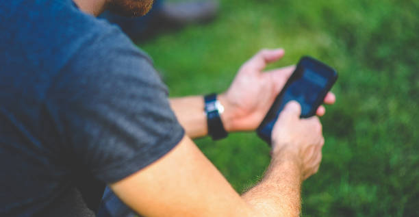 istock Hands and phones Men's phone 1007273898