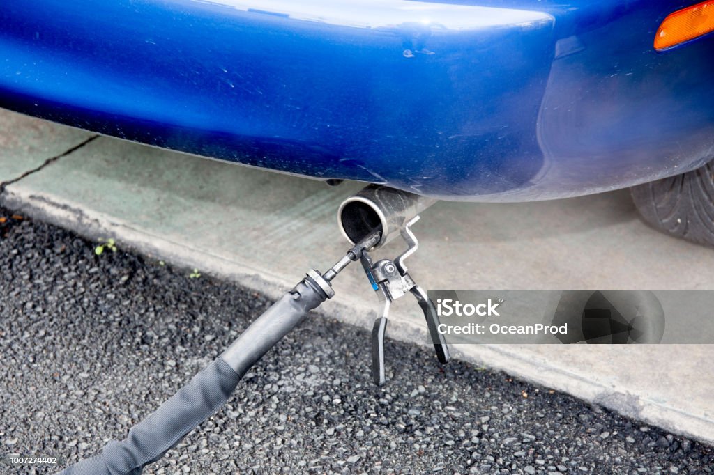 car passes an anti pollution test car passes an anti pollution test for a technical inspection Scientific Experiment Stock Photo