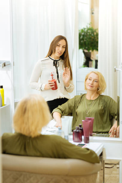 istock Nice skillful woman talking to her client 1007285282