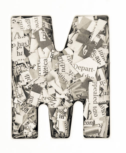 istock capital letter made from newspape 1007285318