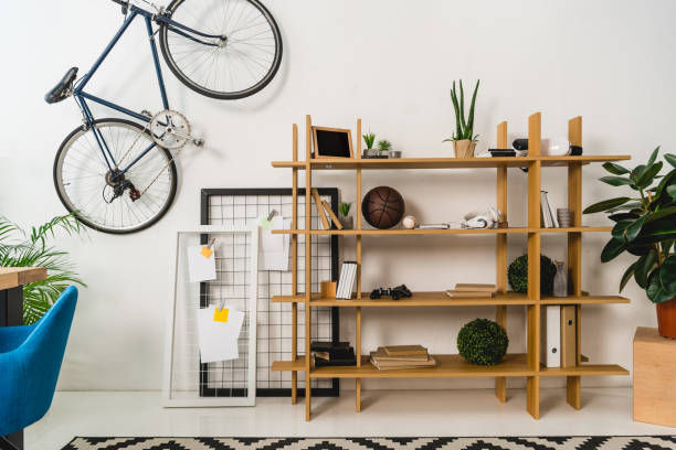 istock bike on wall and shelves with stuff at home 1007294316