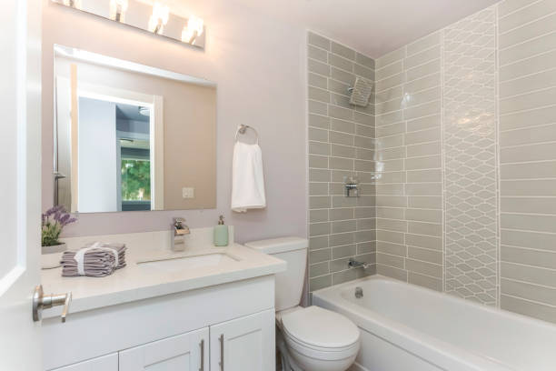 istock Well designed bathroom with mosaic tiled wall. 1007295020