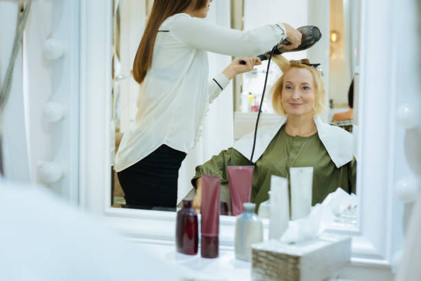 istock Positive nice woman having a new hairstyle done 1007299636