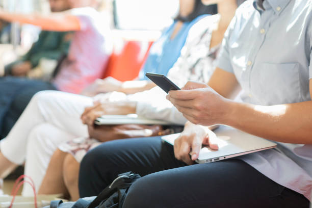 istock Unrecognizable man waits for flight in airport 1007304070