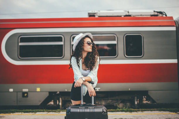 istock Young woman waiting for the train 1007307776