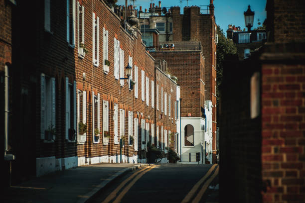 istock Houses lined up in the narrow road 1007310142