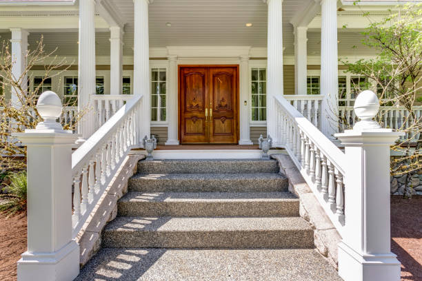 Entrance to a luxury country home with wrap-around deck. stock photo
