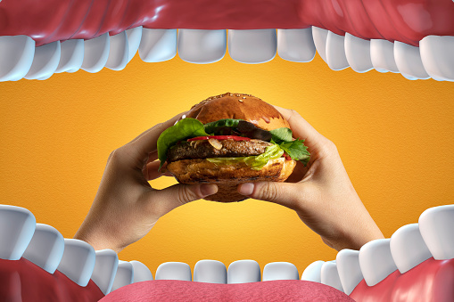Comer hamburguesa photo