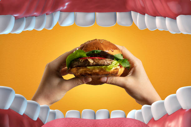 burger eating - burger hamburger large food imagens e fotografias de stock