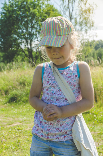 istock child with a net catches a butterfly 1007326566