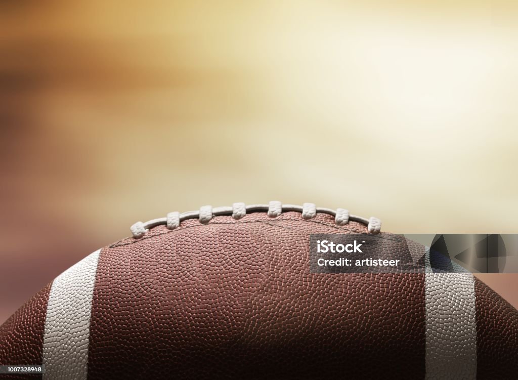 American. American football ball on black background American Football - Sport Stock Photo