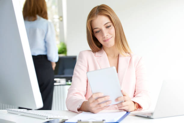istock Young businesswoman using digital tablet 1007332394