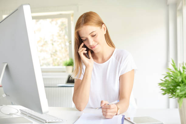 istock Young professional woman working at the office 1007332572