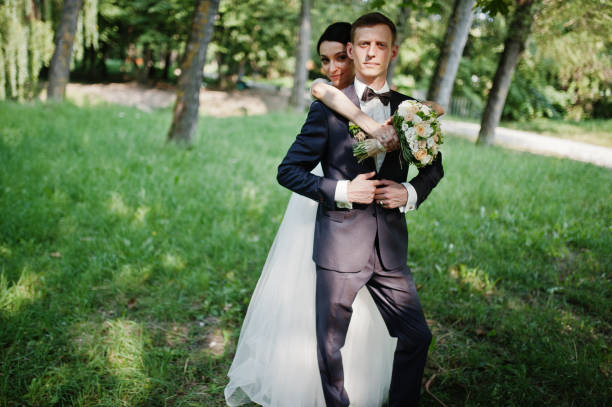 istock Young newlyweds at their wedding day 1007339184