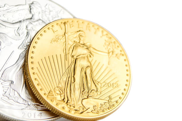 istock silver eagle and golden american eagle one ounce coins 1007341826