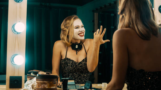 istock Tired actress rehearsing scenes in front of mirror 1007345224