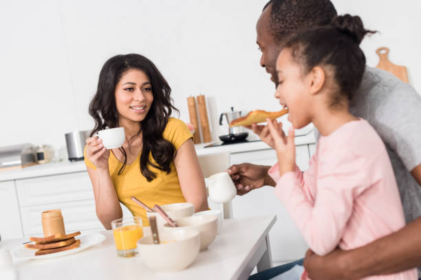 istock young family having breakfast on kitchen together 1007345658