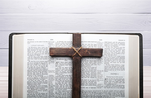 Open  bible book and cross