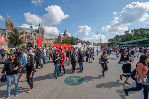 Amsterdam, Netherlands - sep 03, 2017 : Many tourists on the museum square in Amsterdam.