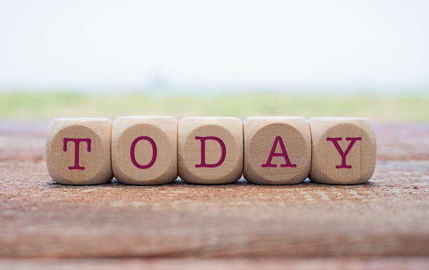 istock Today word written on cube shape wooden blocks on wooden table. 1007374668