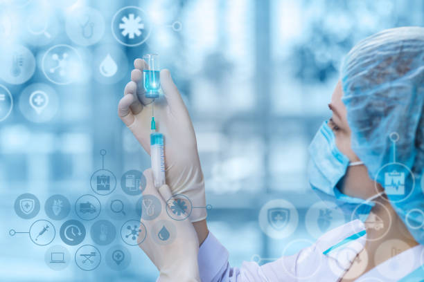 istock Nurse gaining medicine into the syringe for injection. 1007384422