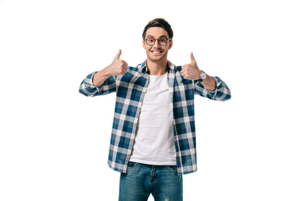 istock smiling handsome man showing thumbs up isolated on white 1007387820