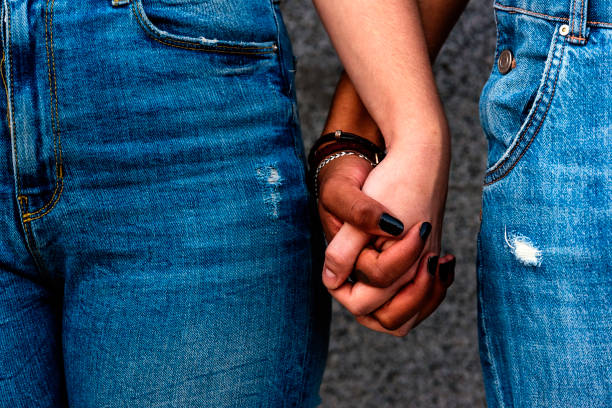 Close up of hands of diverse races. Close up of hands of diverse races. Diverse races concept. behavior femininity outdoors horizontal stock pictures, royalty-free photos & images