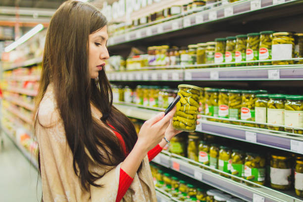 istock Woman in supermarket. 1007412738