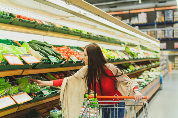 istock Beautiful woman grocery shopping 1007413128