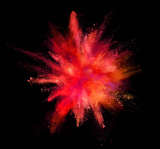 istock Coloured powder explosion isolated on black background 1007415634