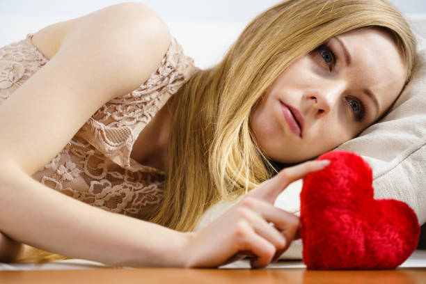 istock Sad woman on Valentines day 1007416330