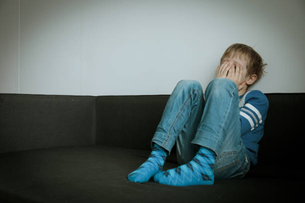 istock sad child, stress and depression 1007432844