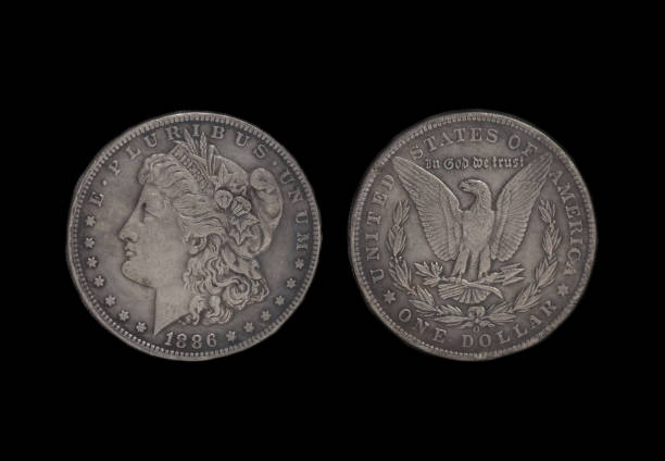 American silver eagle one dollar coin American silver eagle one dollar coin isolated on black background dollar bill eagle stock pictures, royalty-free photos & images
