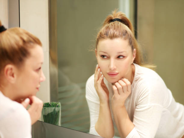 istock Magic anti-aging cream.Applying the cream 1007454594