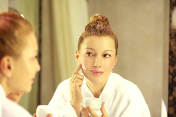 istock Magic anti-aging cream.Applying the cream 1007454606