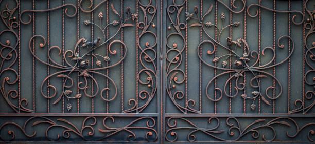 istock ornate wrought-iron elements of metal gate decoration 1007455554