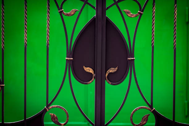 istock ornate wrought-iron elements of metal gate decoration 1007455598
