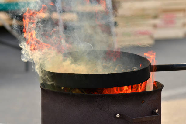 istock chestnuts grilling on the smoldering fire 1007458830