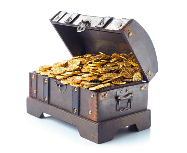 istock Treasure chest filled with gold coins 1007461916