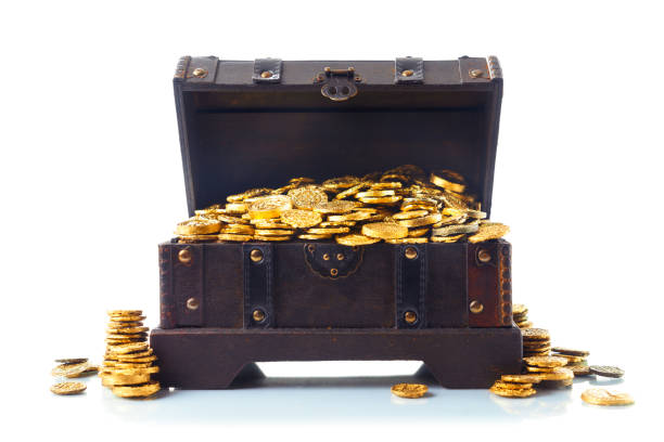 istock Treasure chest filled with gold coins 1007463534