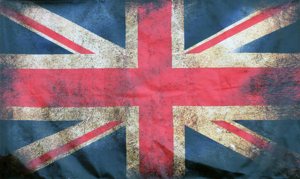 istock full frame image of an old stained union jack british flag with dark crumpled edges 1007471436